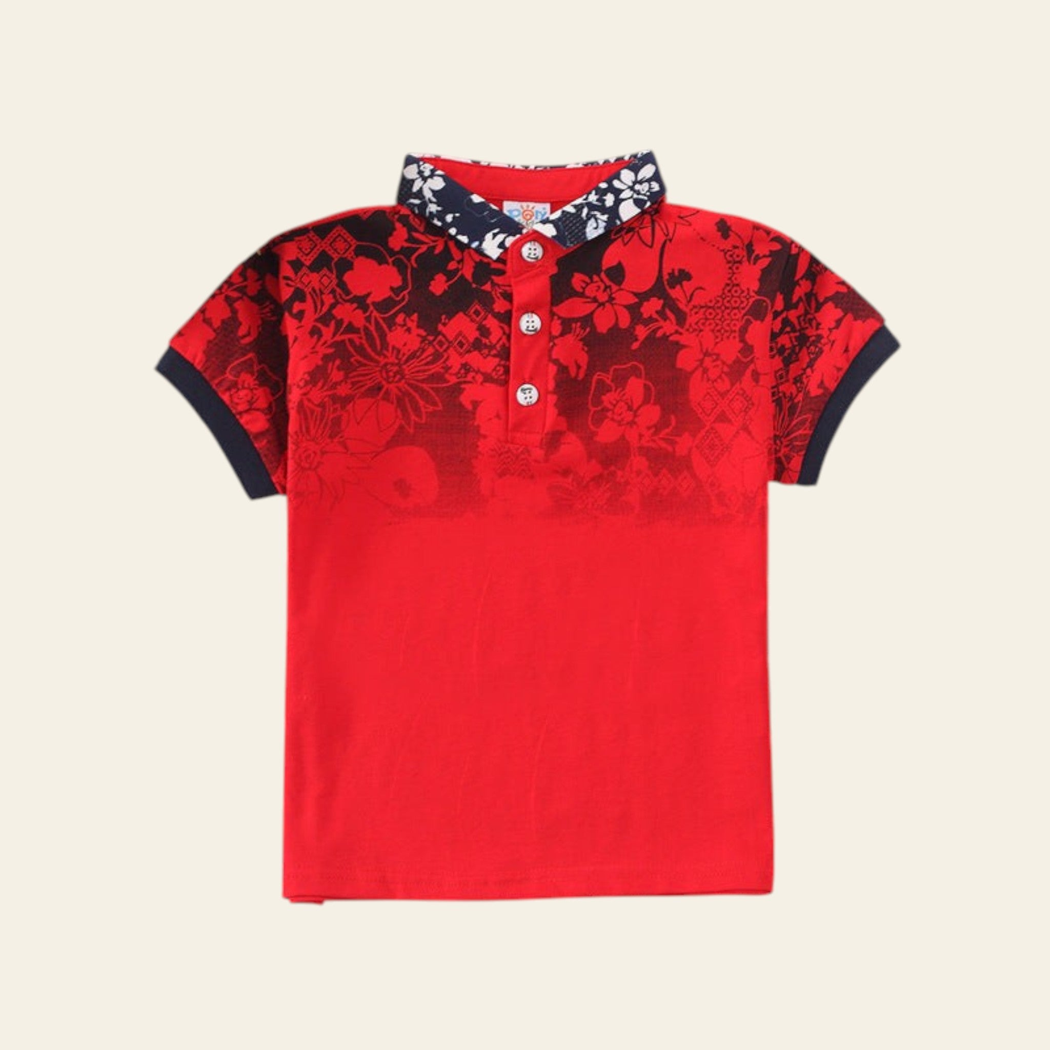 Red polo shirt with floral pattern on a striped surface