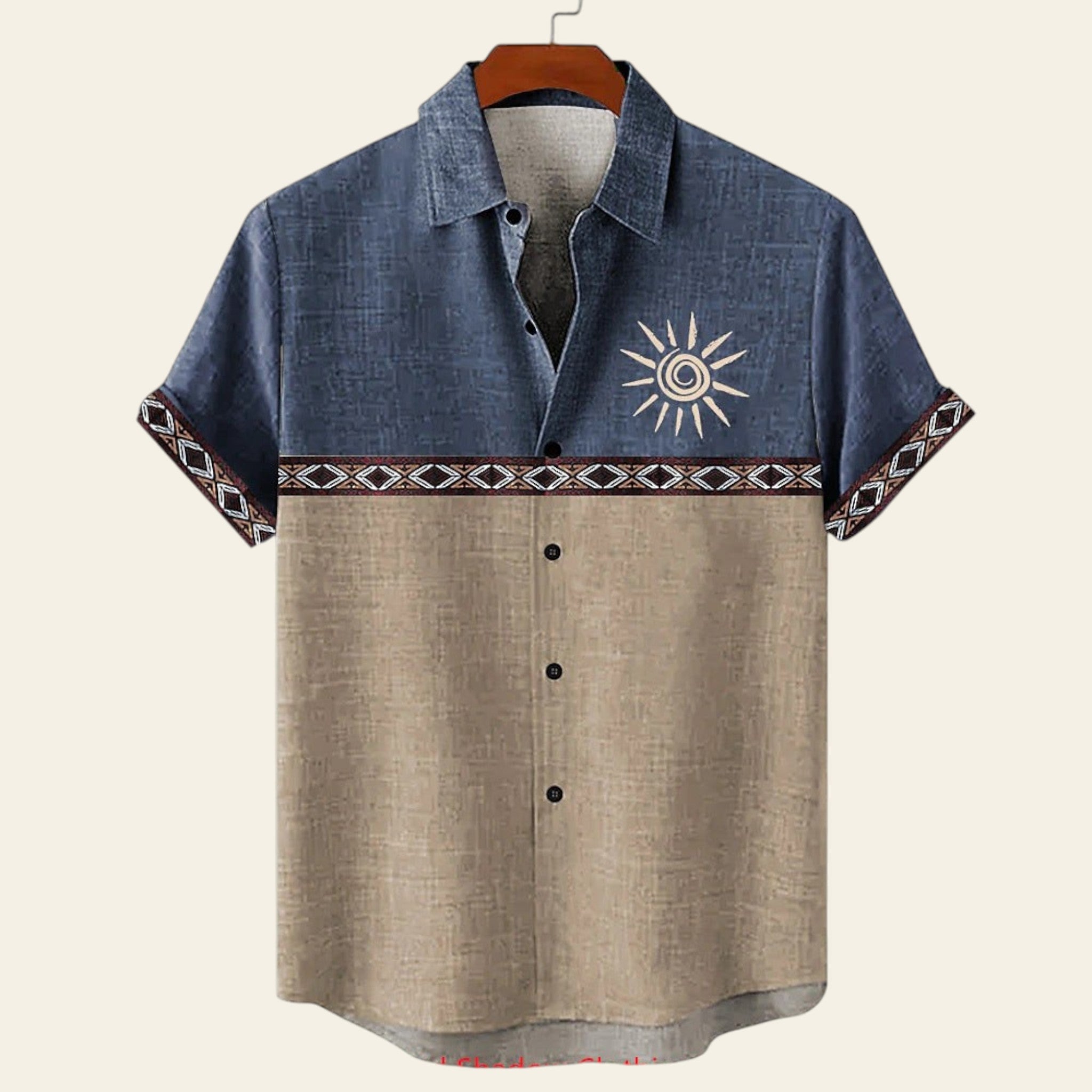 Two-tone shirt with sun design on a hanger against a white background