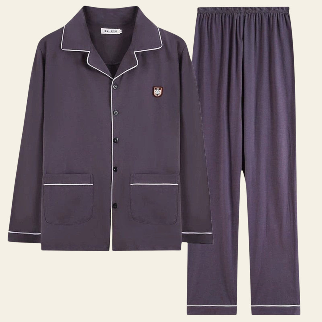 Men's navy blue cotton pajama set with long sleeve button-up top and matching pants