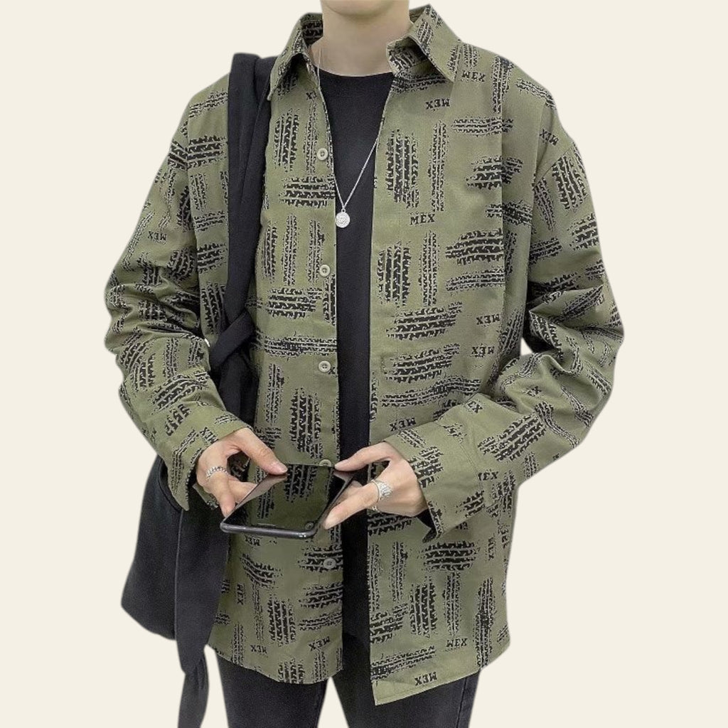 Close-up of the green fabric print and zipper details