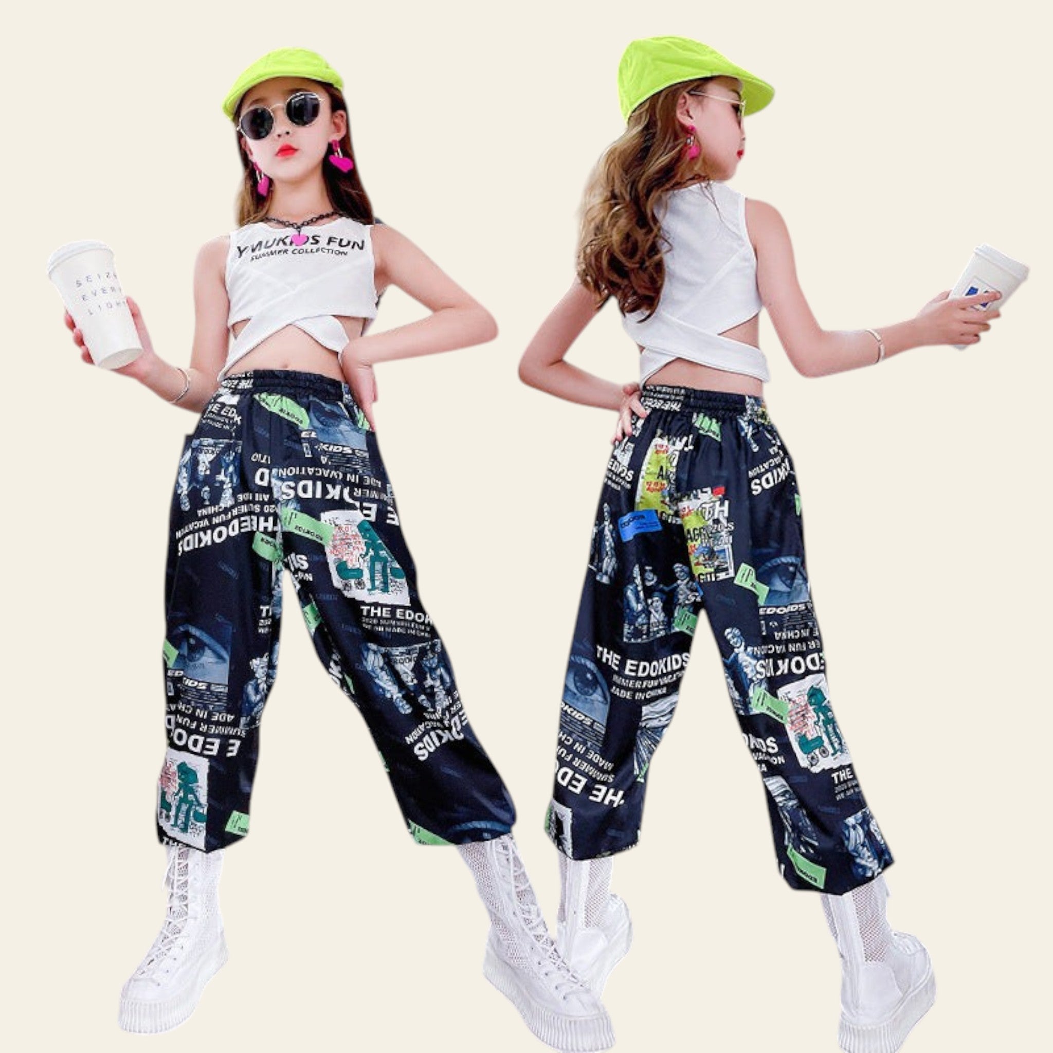 Girl wearing black graphic cargo pants with loose fit streetwear style