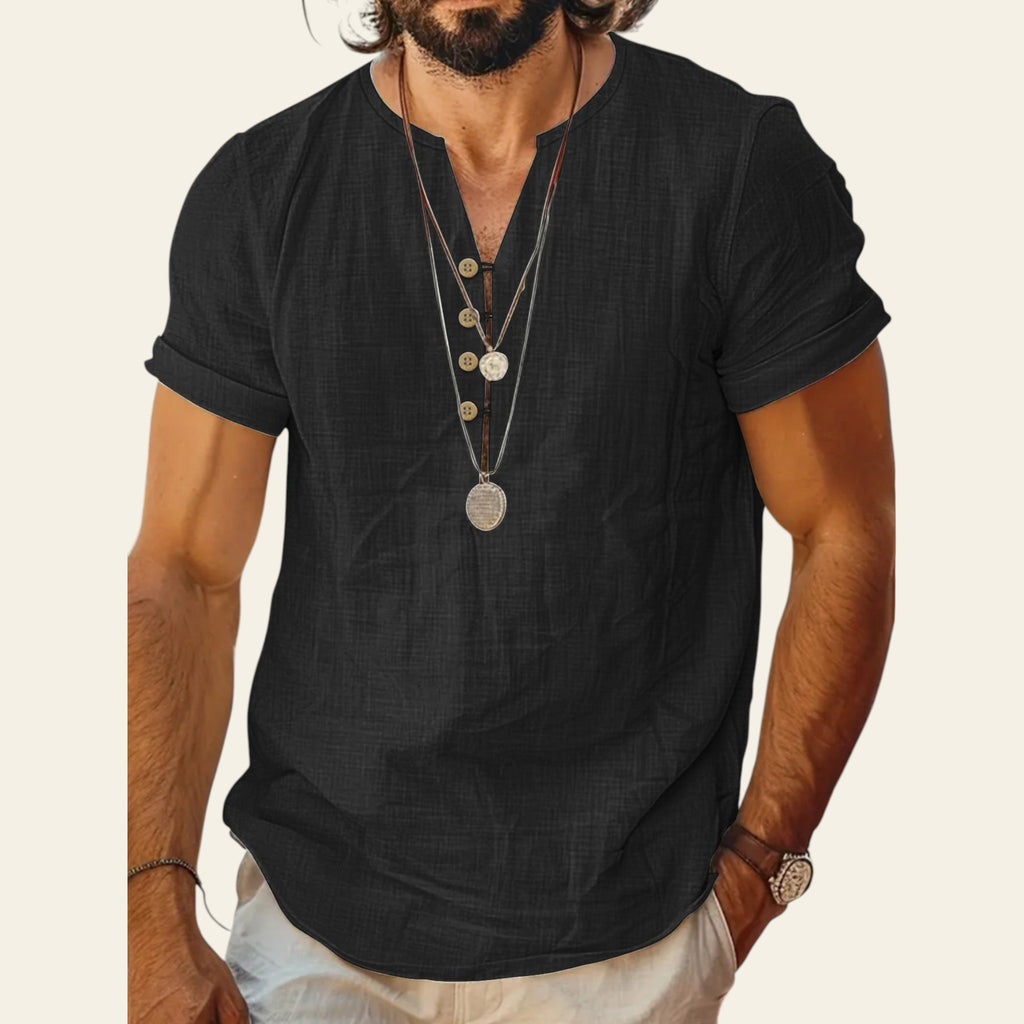 Man wearing a lightweight short sleeve cotton top in Black