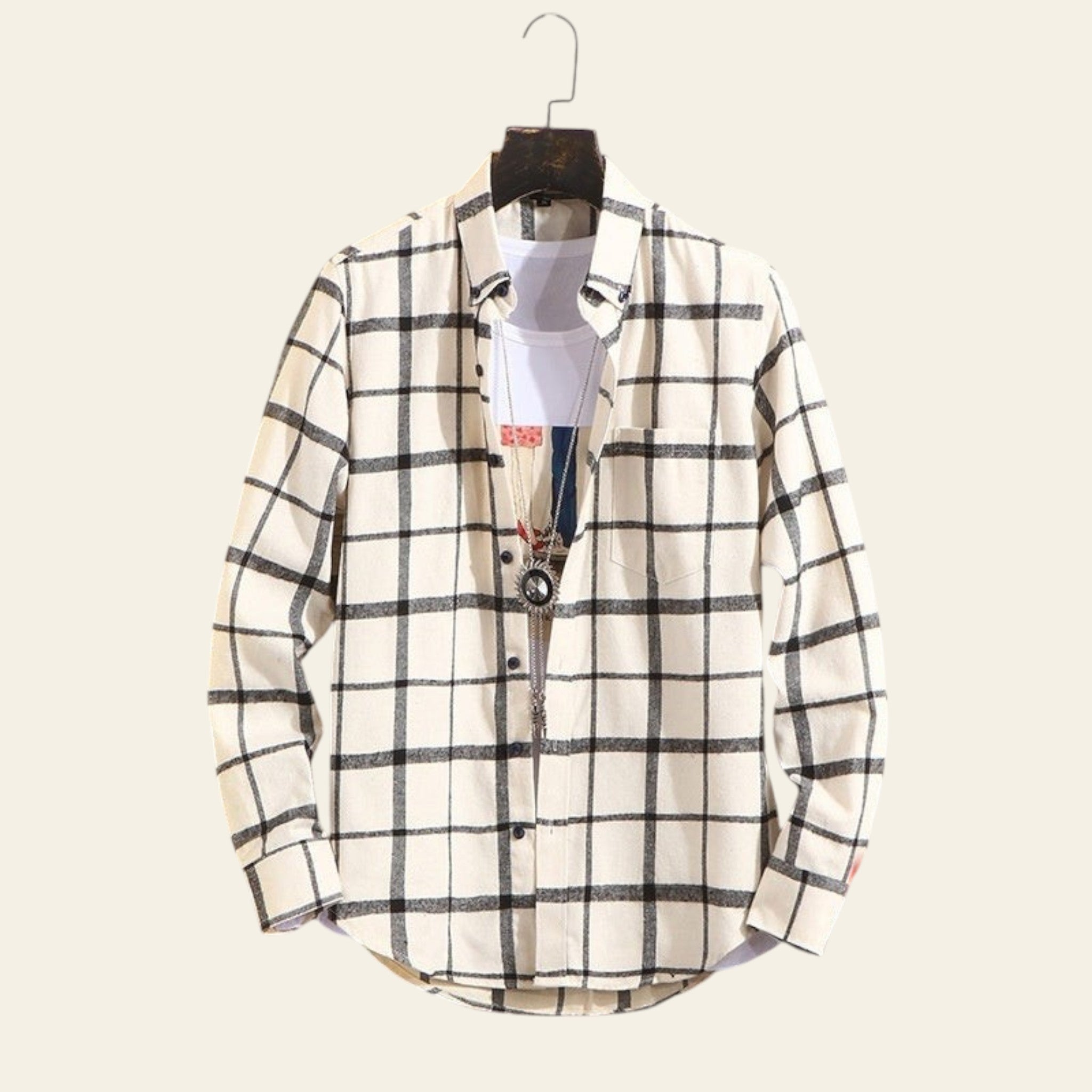 White plaid men's button up shirt displayed on hanger