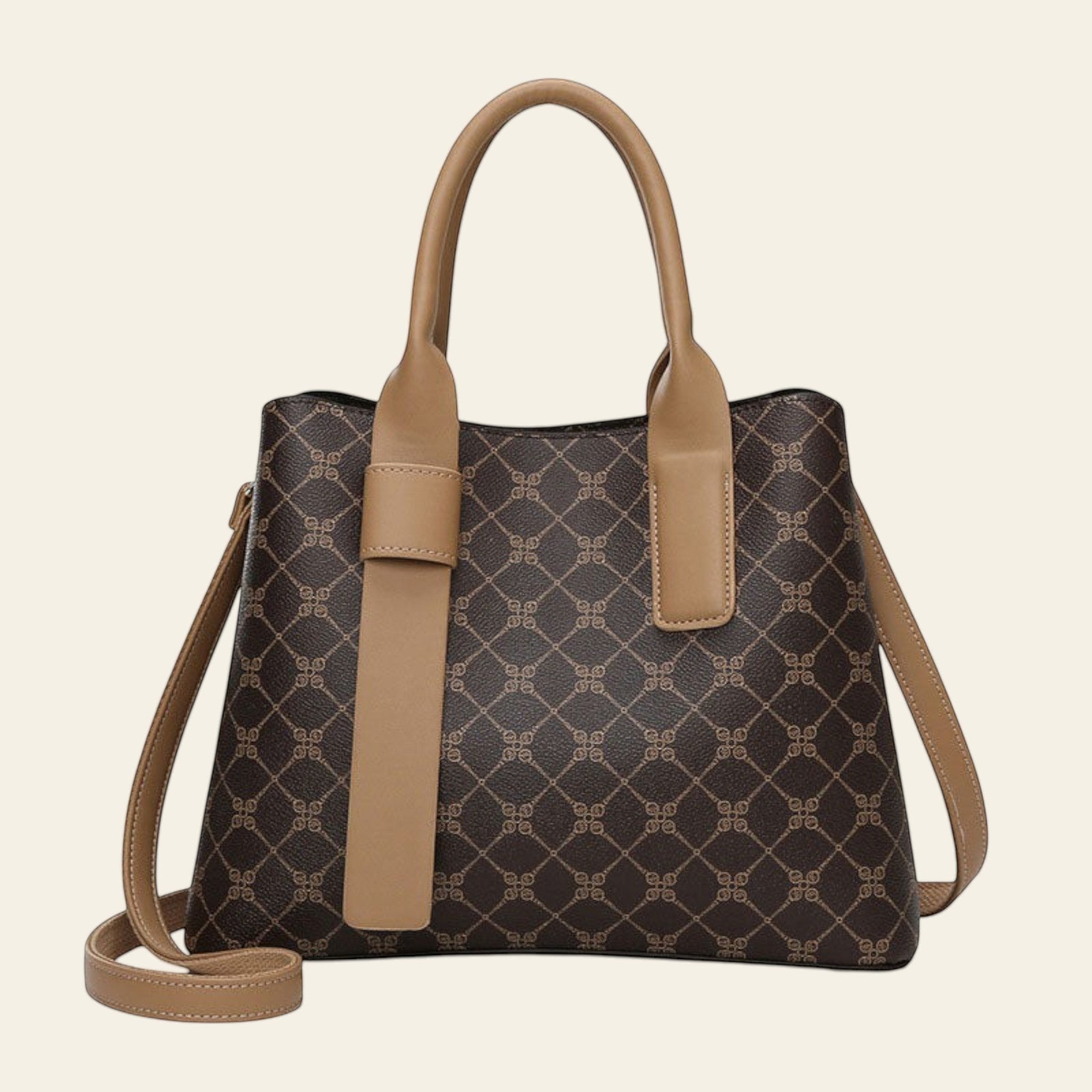 Brown handbag with beige accents and an orange gift box on a white background