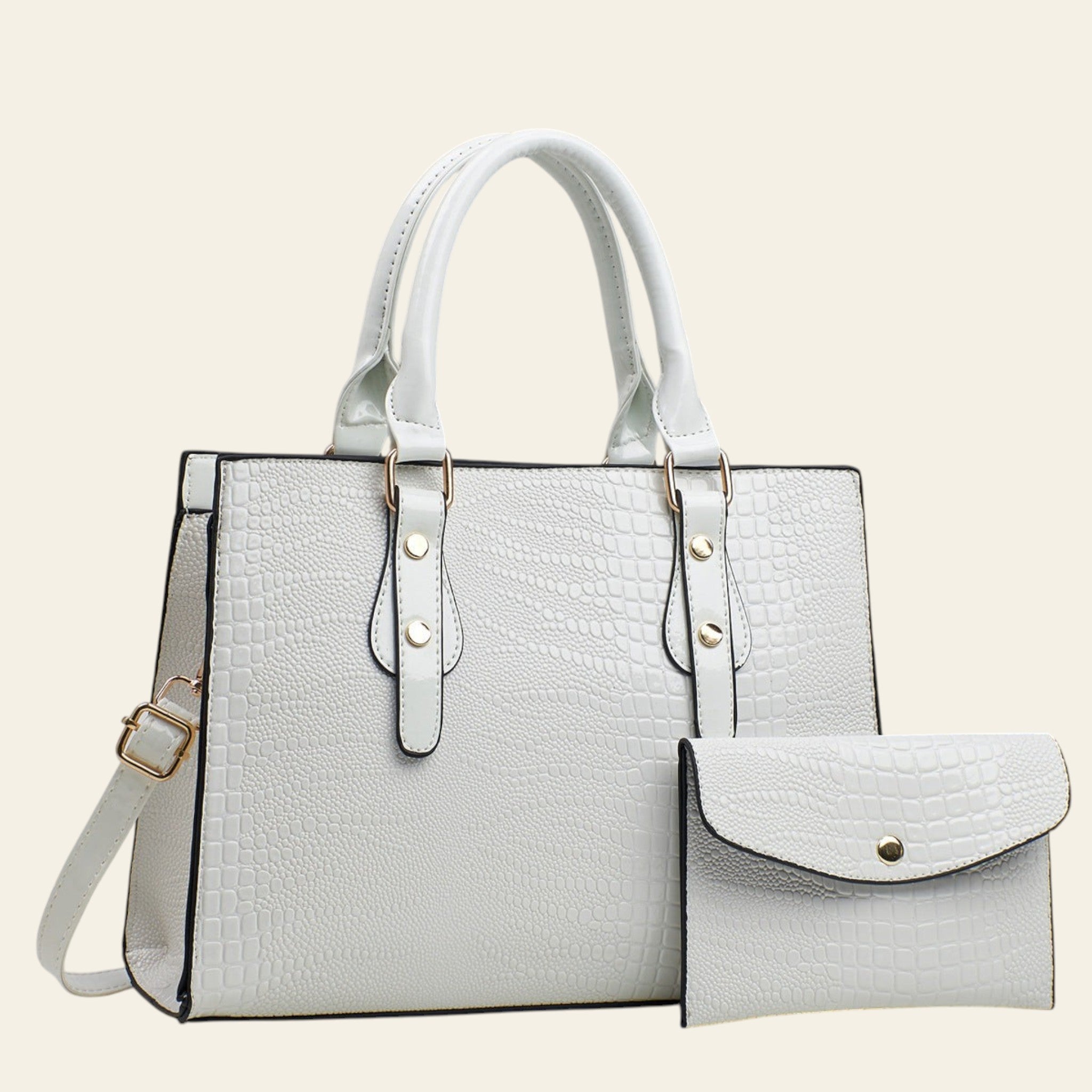 White handbag with matching wallet on a gray background
