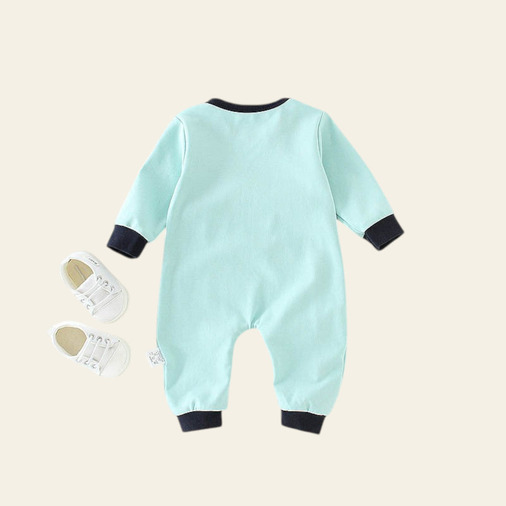 Light blue baby romper with black cuffs on a white background