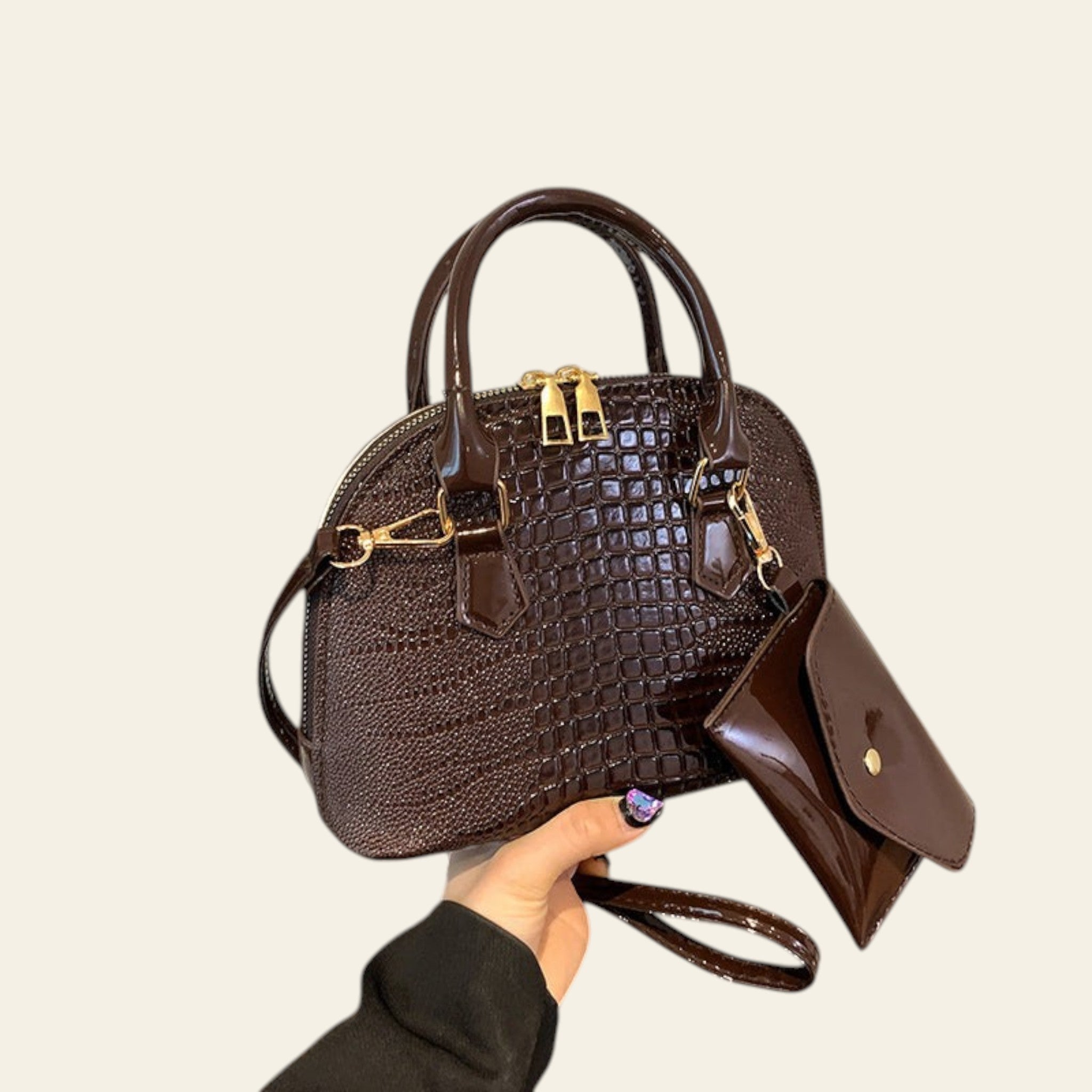Dark brown textured leather handbag with top handle and matching pouch