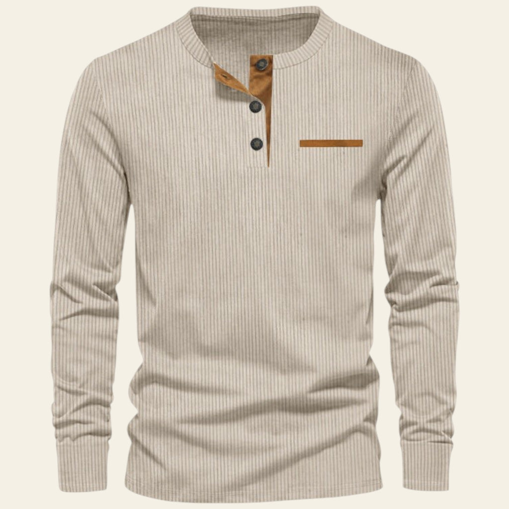 Beige long-sleeve shirt with brown buttons and placket on a white background