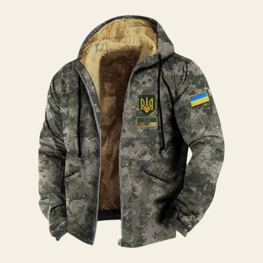 Men's camouflage gray hooded jacket with fleece lining and patch details on textured background