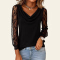 Black lace long-sleeve top worn by a person on a white background