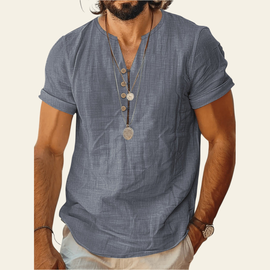 Man wearing a lightweight short sleeve cotton top in Gray