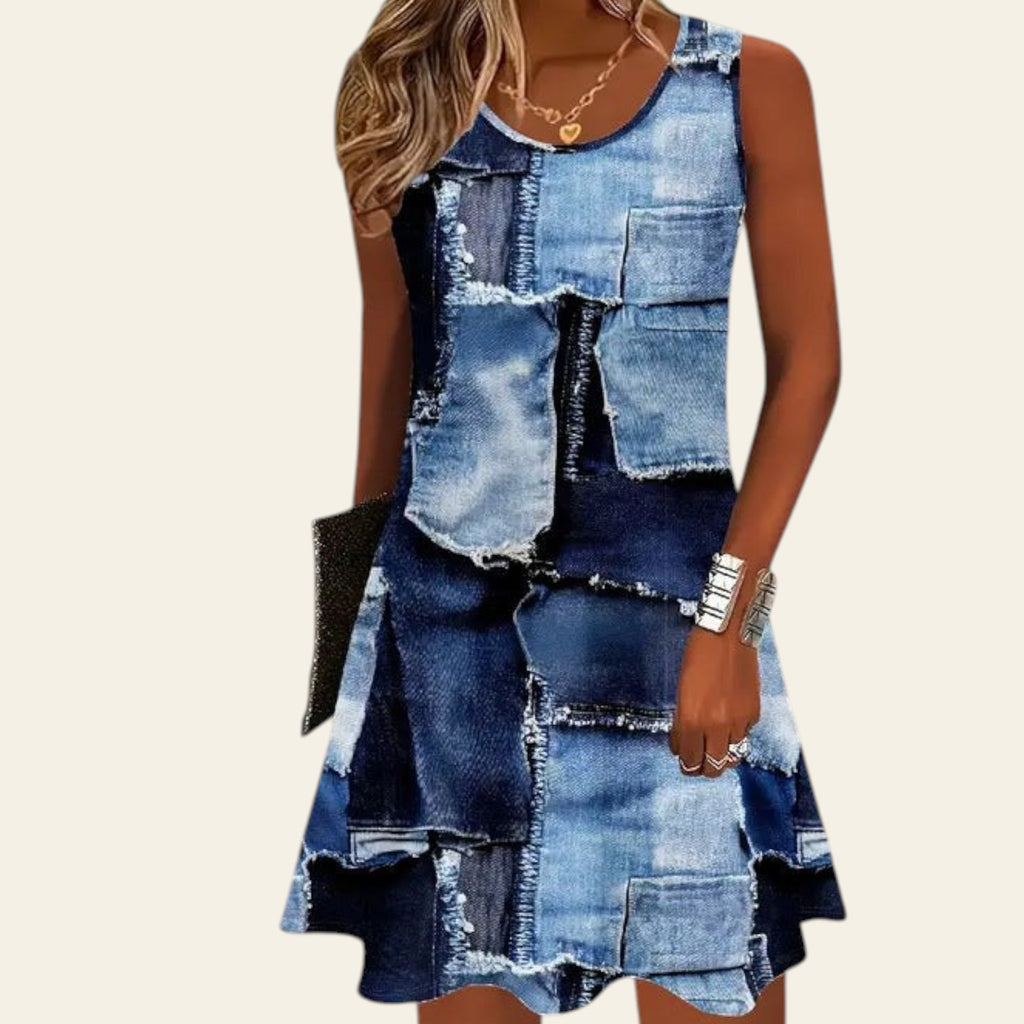 woman wearing a sleeveless blue denim patchwork dress