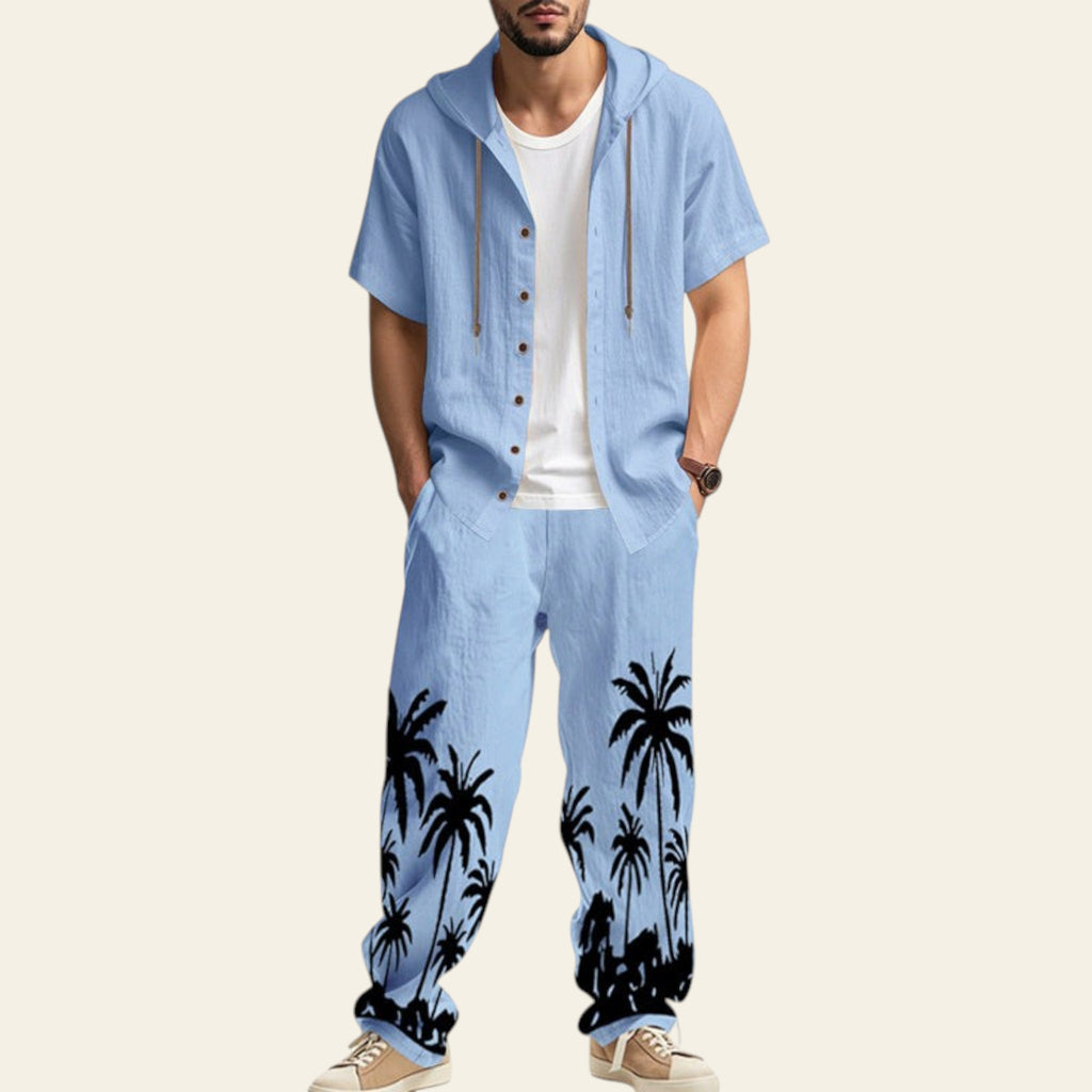 Man wearing a complete men's casual set with hooded short sleeve shirt and matching trousers in light blue color