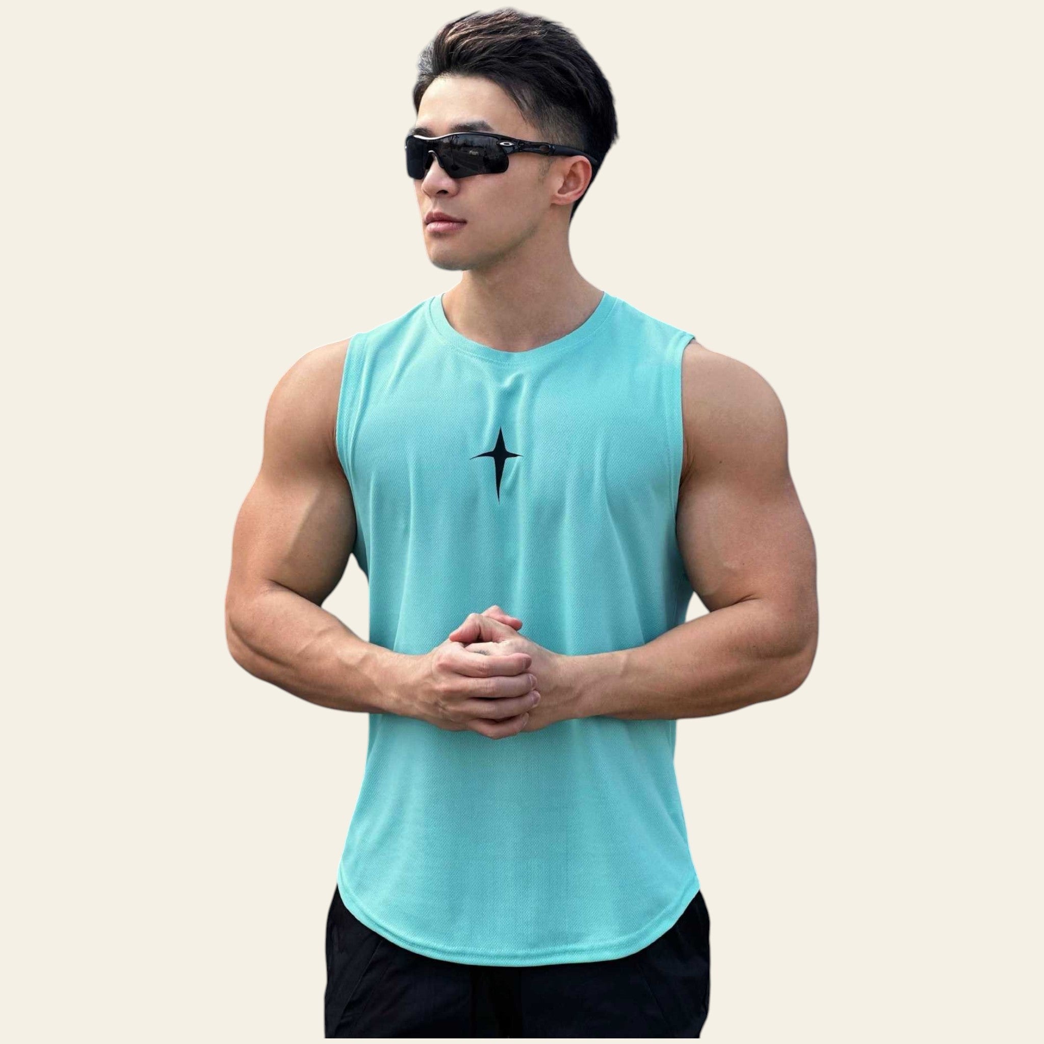 Man wearing a lake blue sleeveless crew neck slim-fit tank top