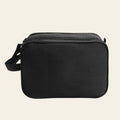 Black rectangular bag with a strap on a white background