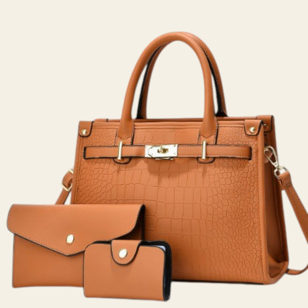 Brown handbag with matching wallet on a light gray background