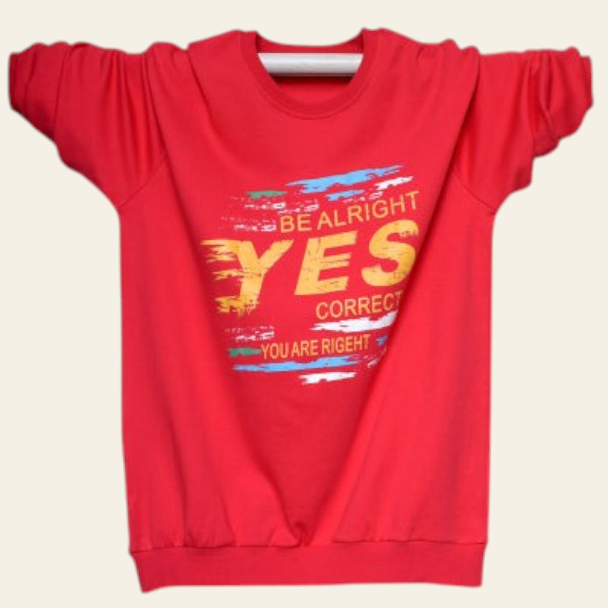 Red sweatshirt with colorful text on a white wooden background