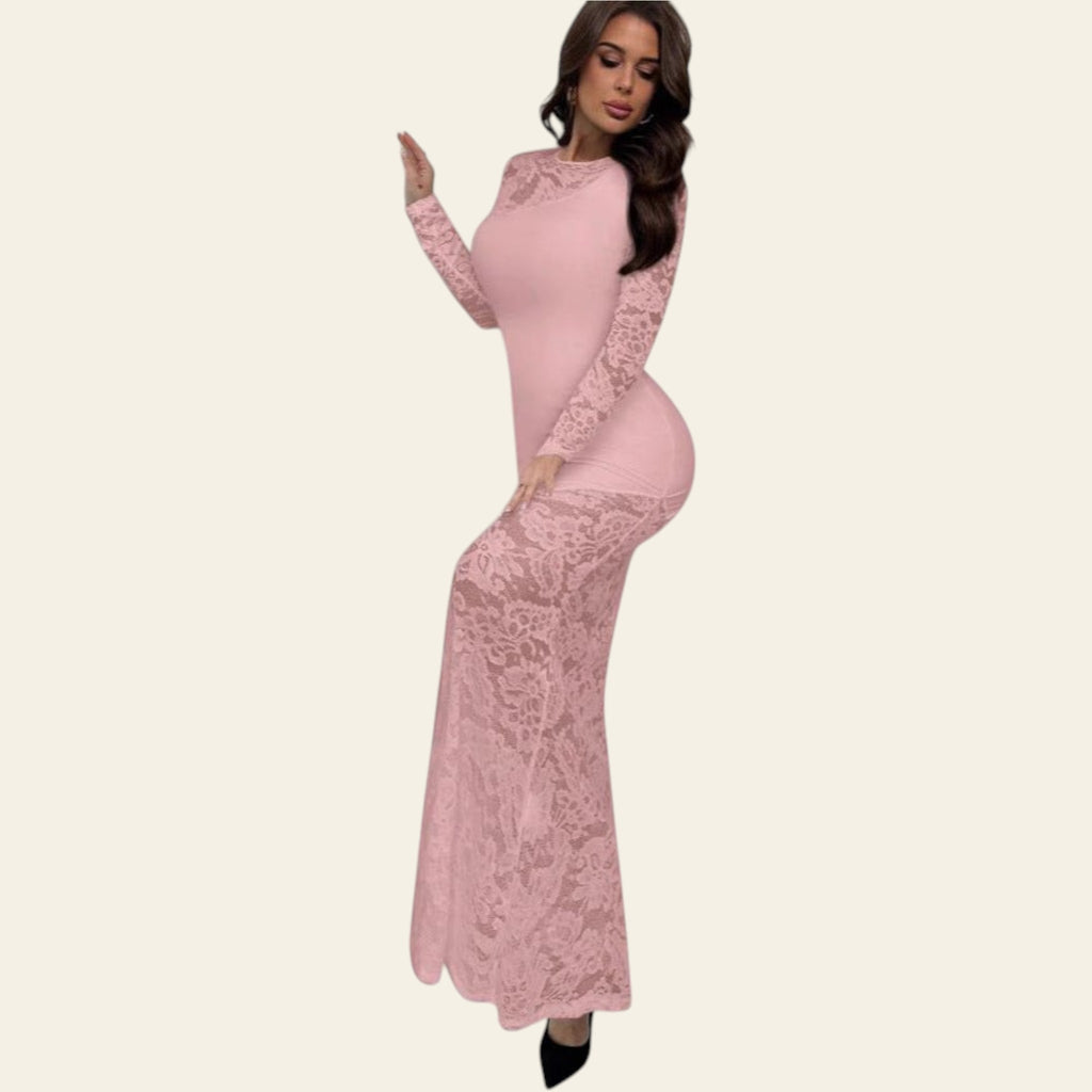 Woman wearing a pink lace long-sleeve bodycon maxi dress with sheer lace detailing, standing against a white background