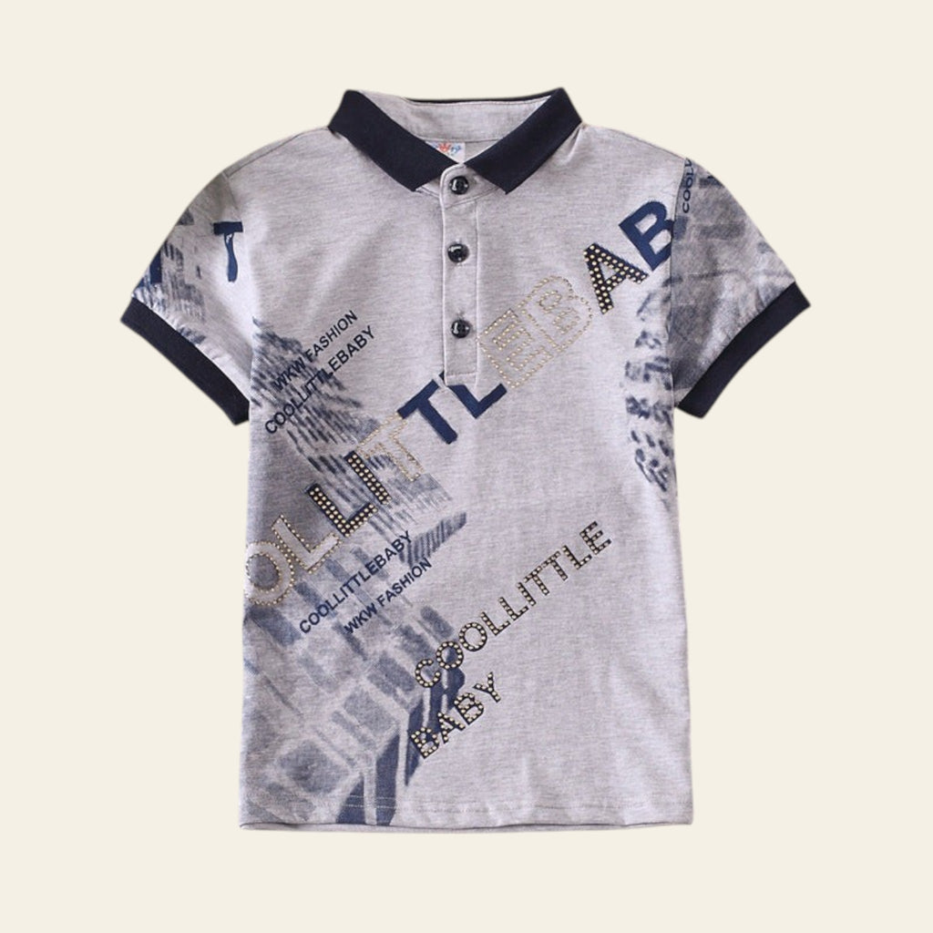 Gray children's polo shirt with text design on a striped surface