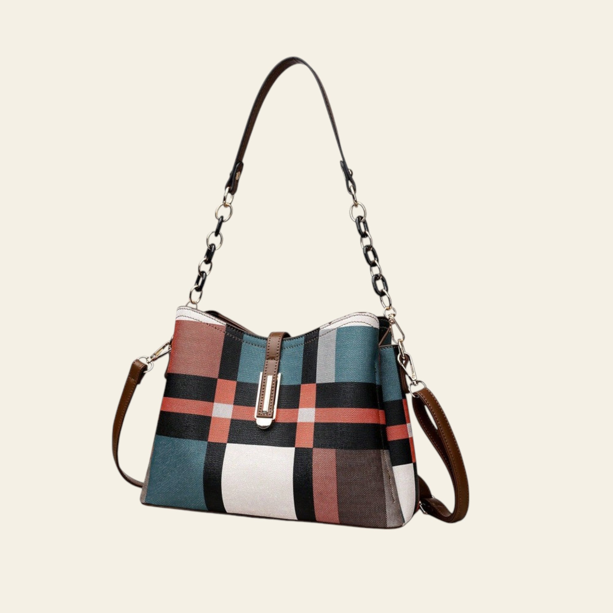 Plaid patterned handbag with a shoulder strap on a white background