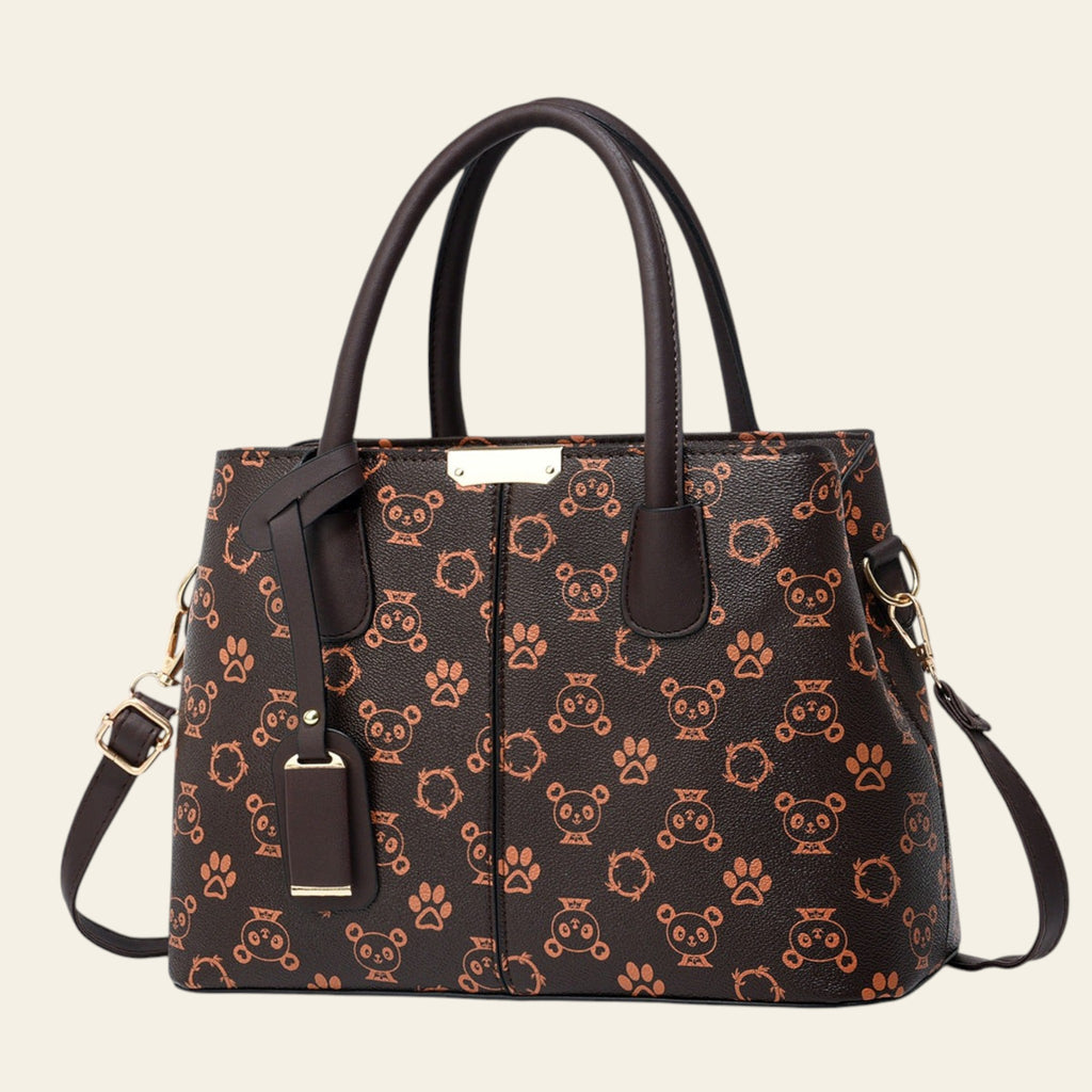 Brown handbag with animal pattern on a white background