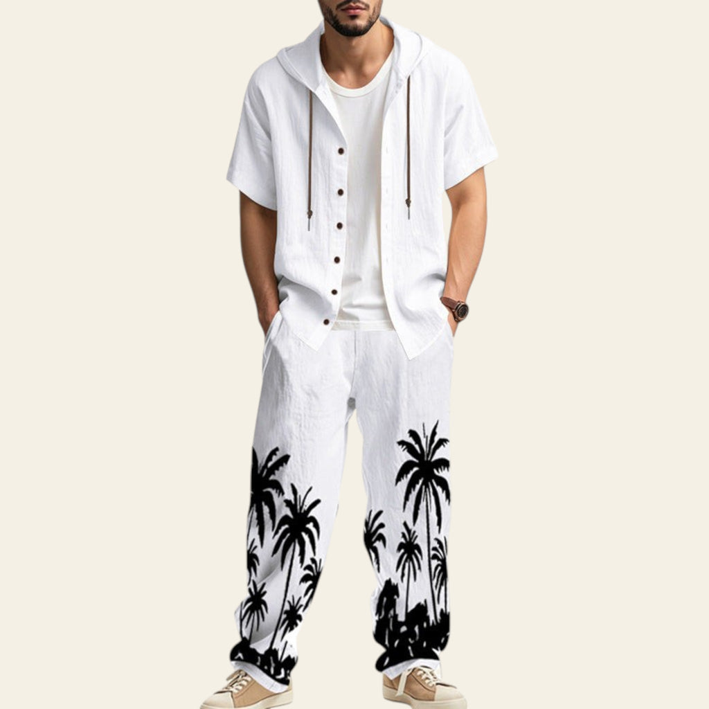 Man wearing a complete men's casual set with hooded short sleeve shirt and matching trousers in white color