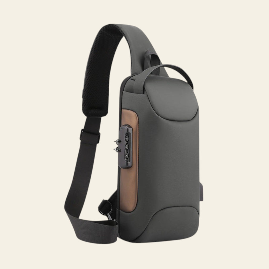 Gray sling bag with a brown accent on a white background