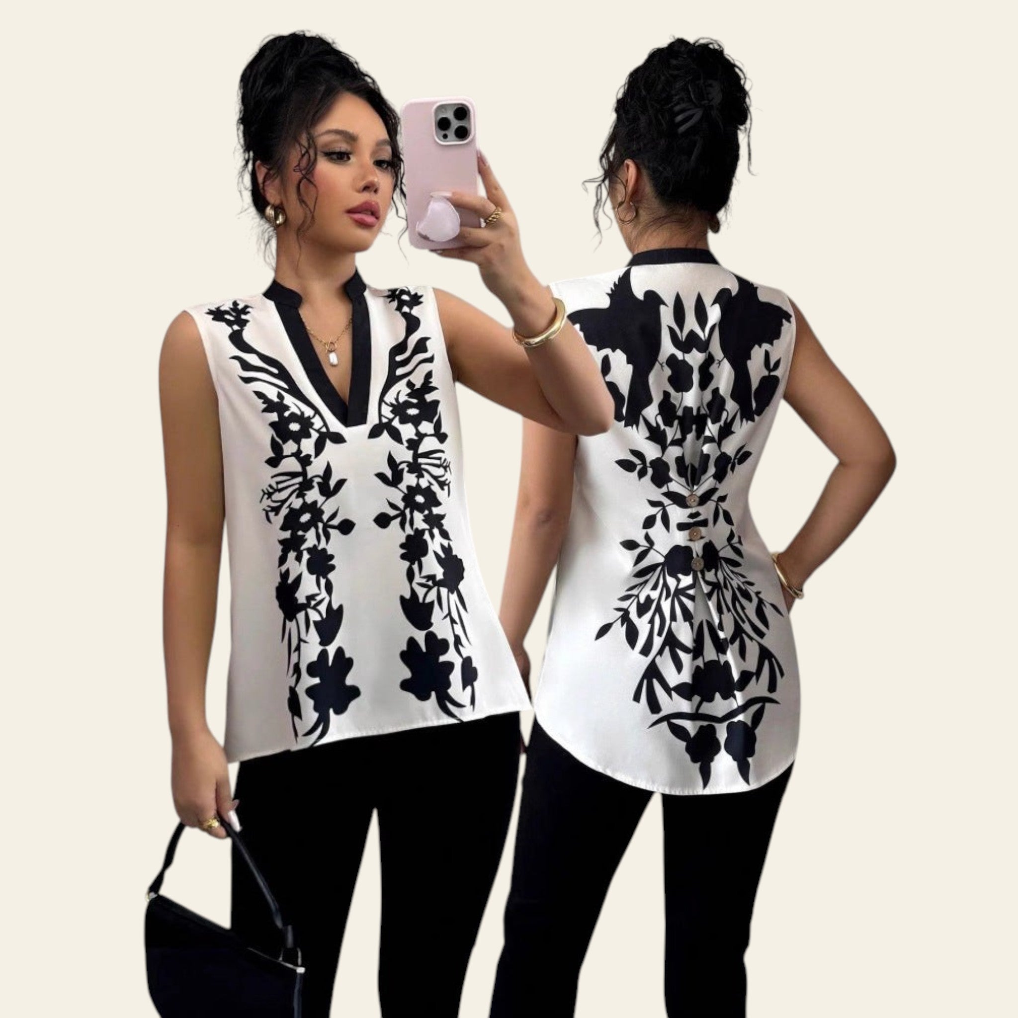 Woman wearing a black and white floral sleeveless top, standing in front of a mirror.