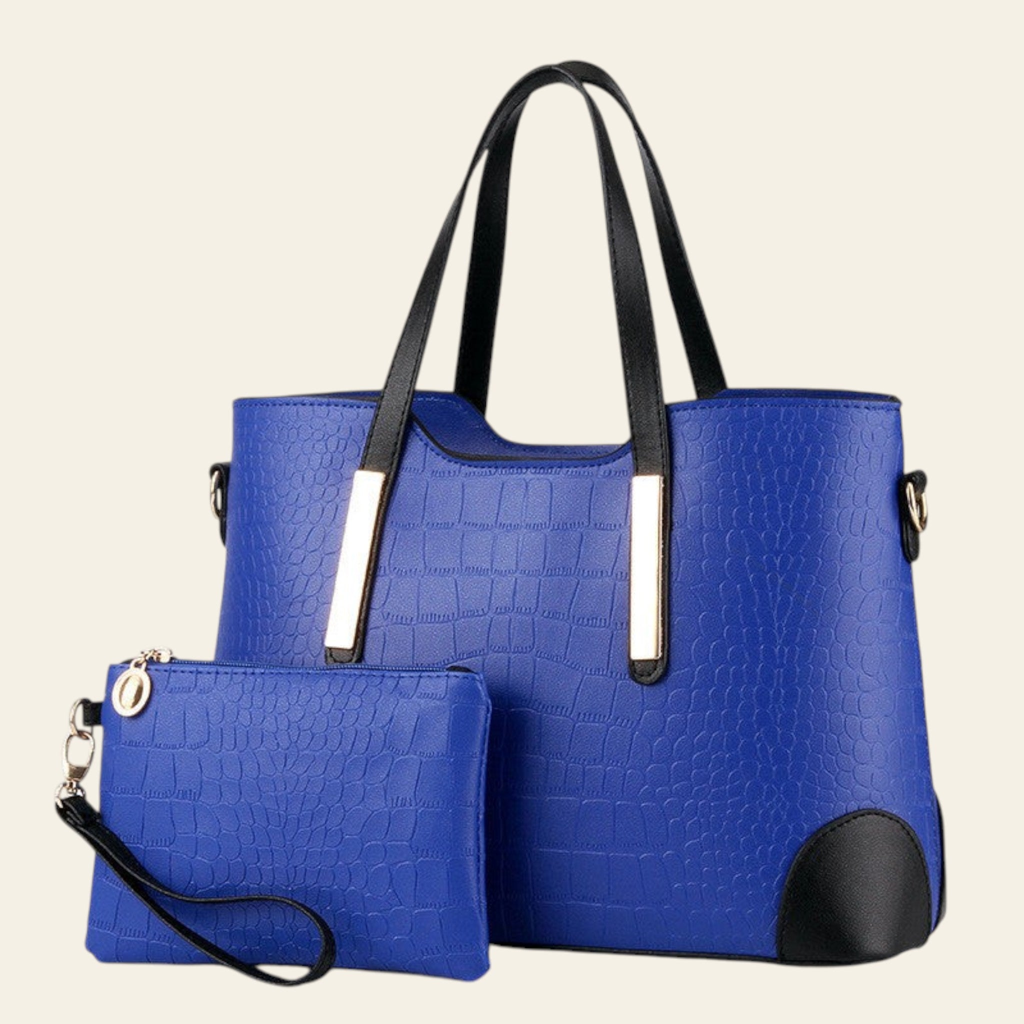 Blue handbag with black handles and trim on a white background