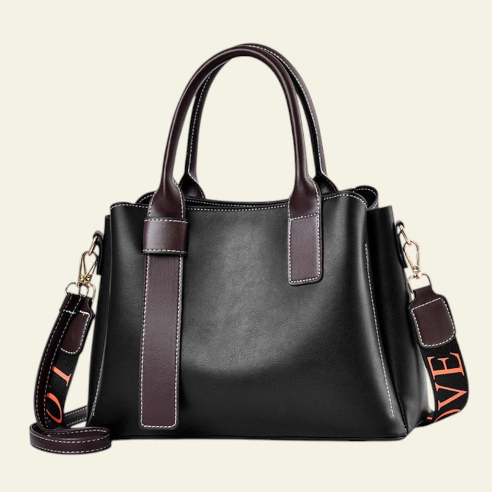 Black handbag with brown accents on a white background