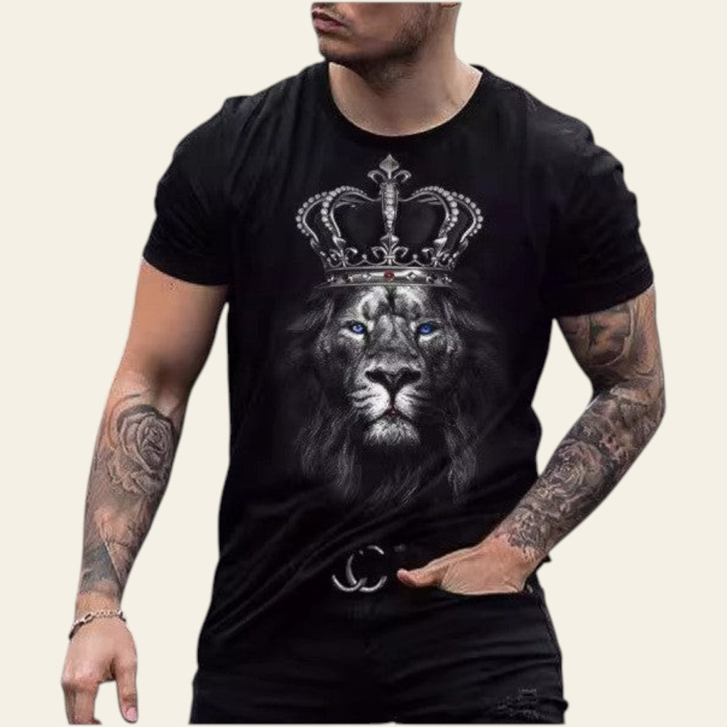 Man wearing a black t-shirt with a lion and crown design, standing outdoors.