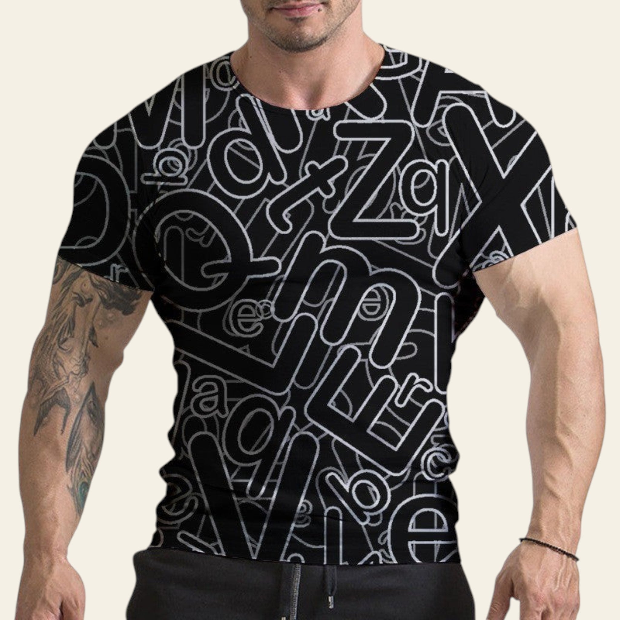 Man wearing a black t-shirt with white geometric pattern on a white background