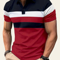 Man wearing a red, white, navy, and black striped casual short- sleeve shirt outdoors