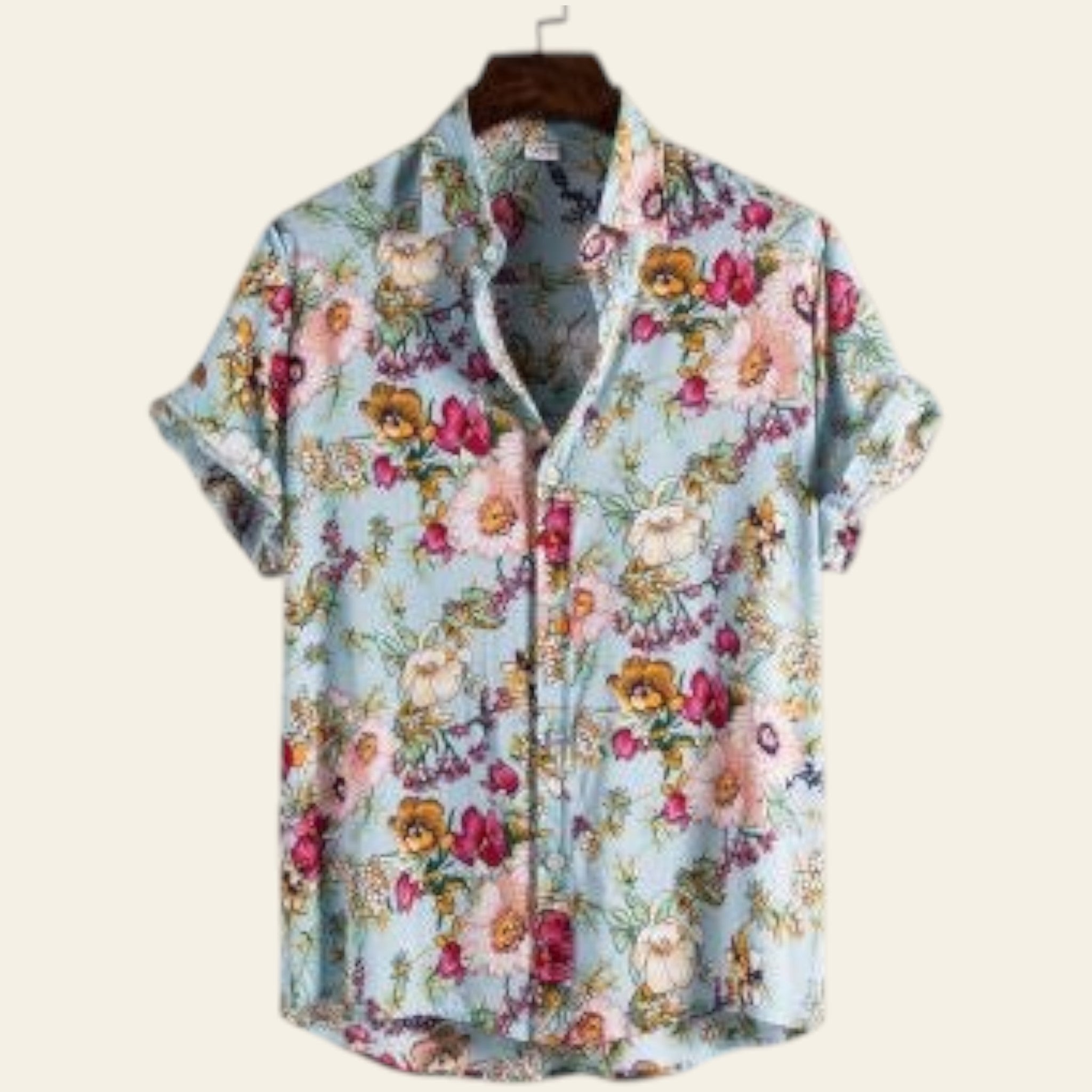Floral patterned shirt on a hanger against a light gray background