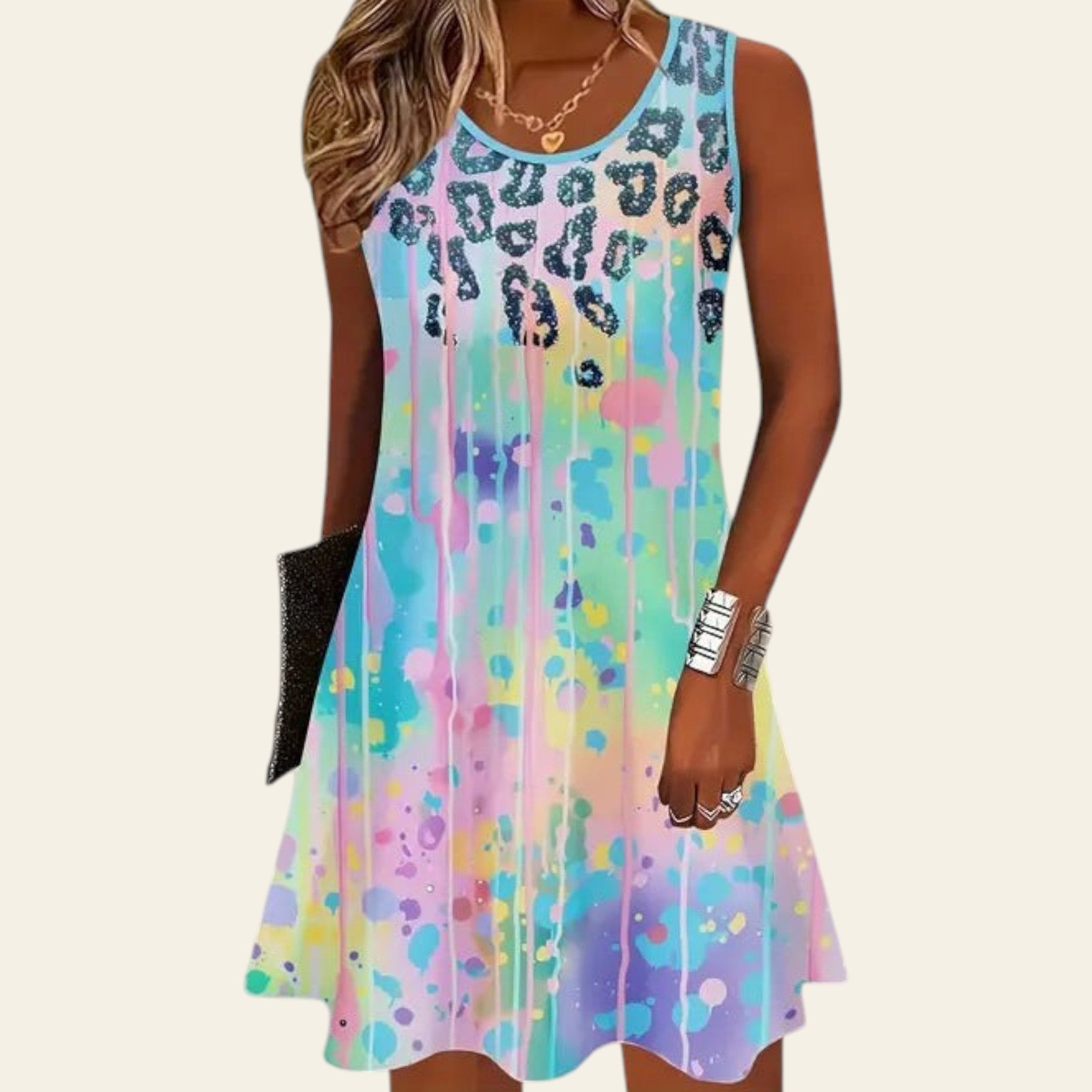 woman wearing a sleeveless multicolor dress with aqua blue tones and leopard print detail