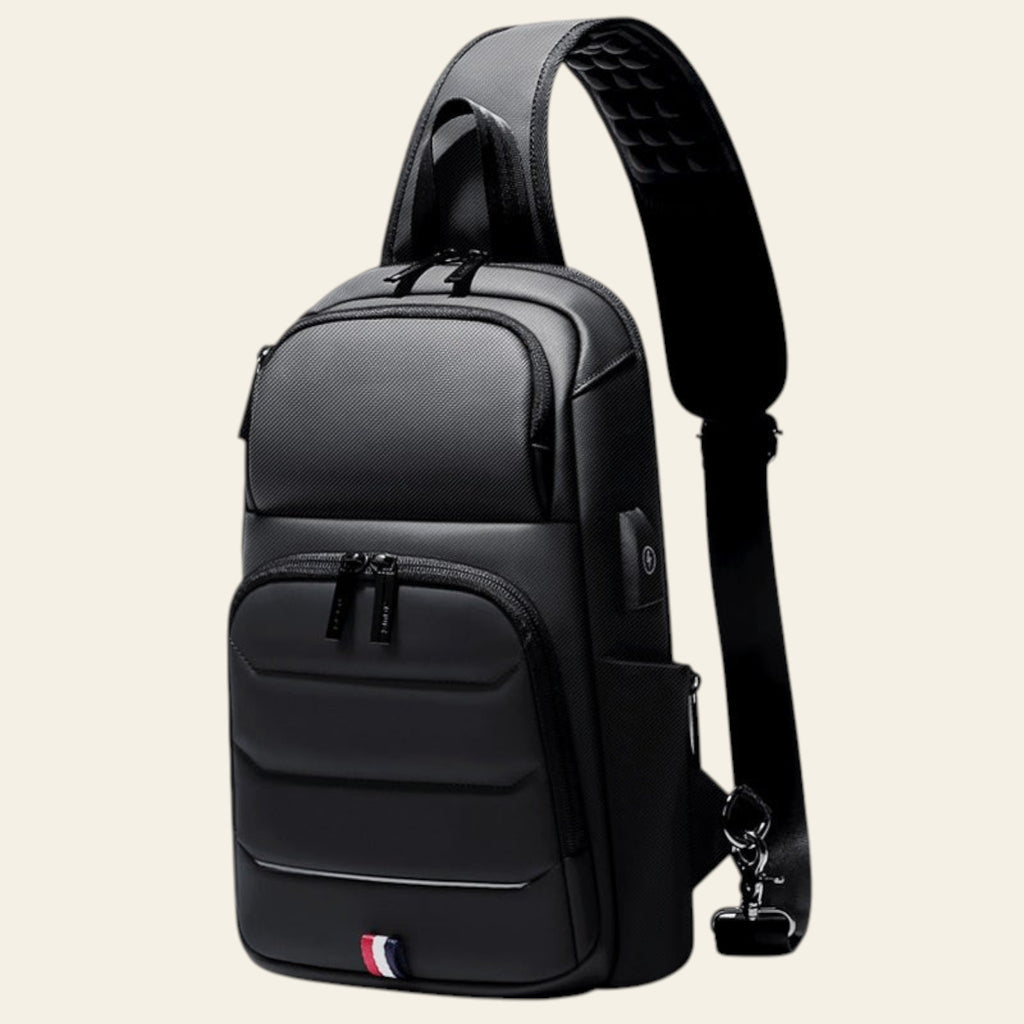 Black sling bag with a visible brand logo on a white background