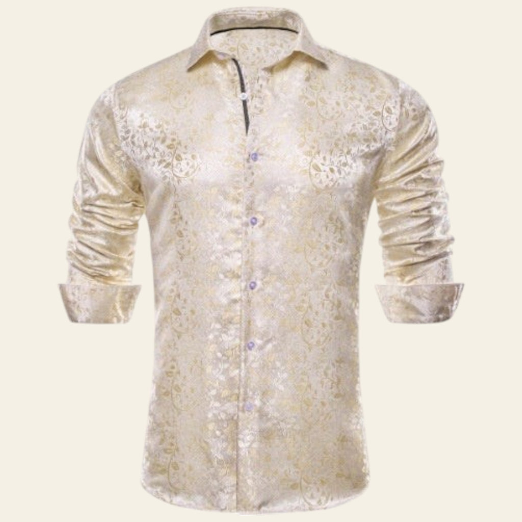 Beige floral patterned shirt on a white background