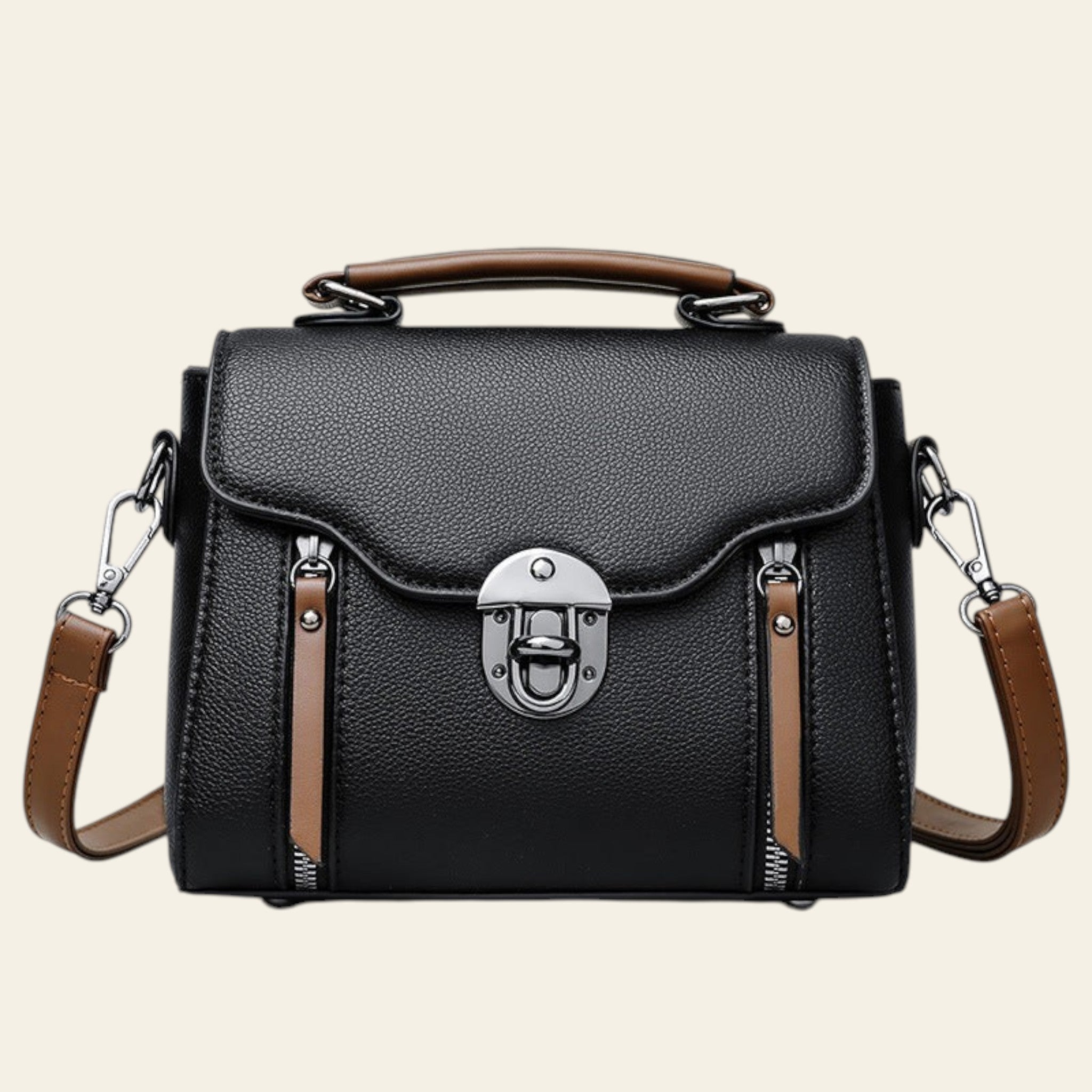 Black handbag with brown straps on a white background