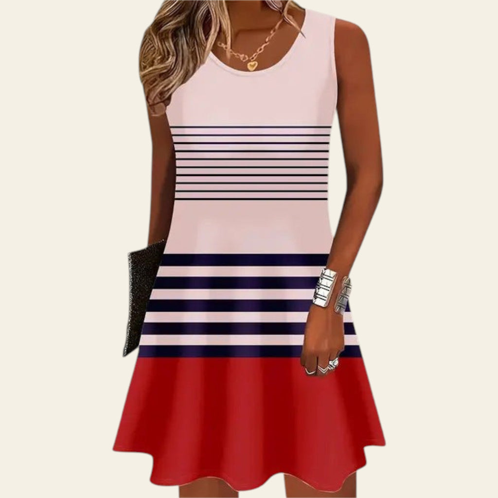 woman wearing a sleeveless dress with red, white, and blue horizontal stripes