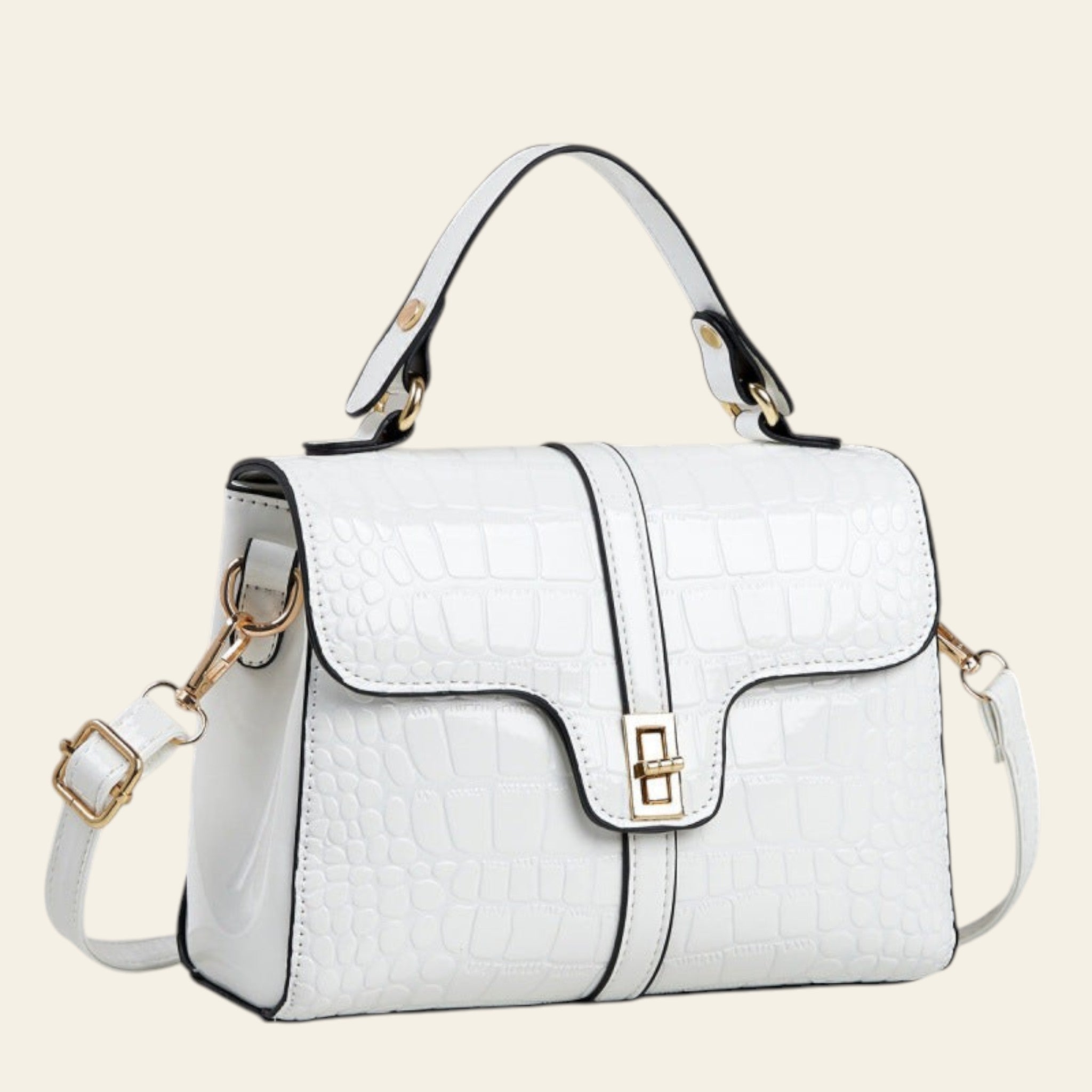 White handbag with black accents on a light gray background