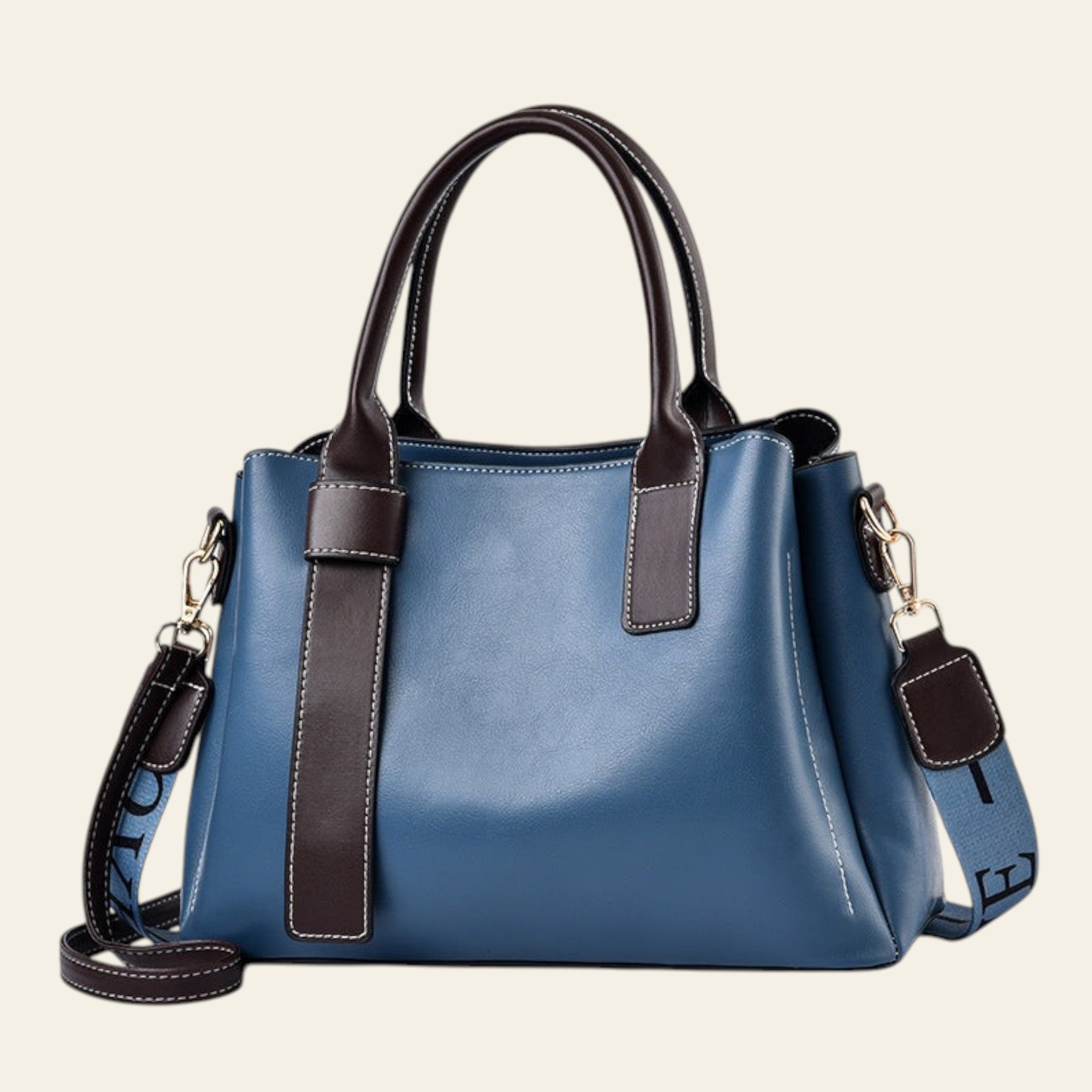 Blue handbag with brown accents on a white background