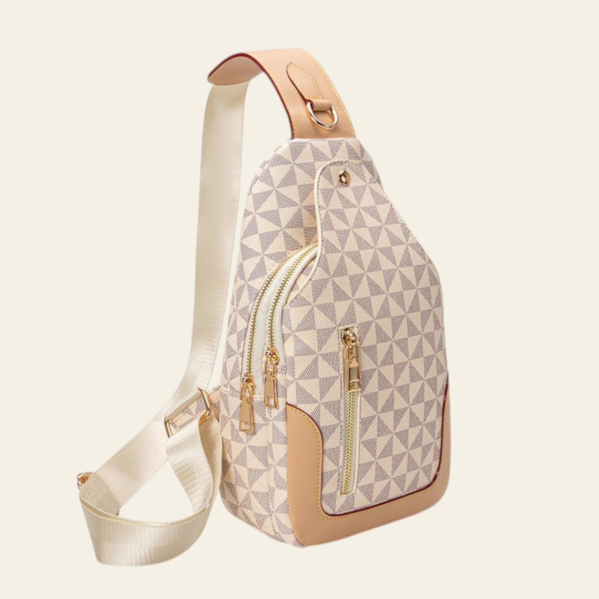 Sling bag with geometric pattern and gold zippers on a white background