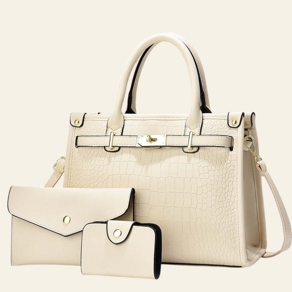 Beige handbag with matching wallet on a light gray background