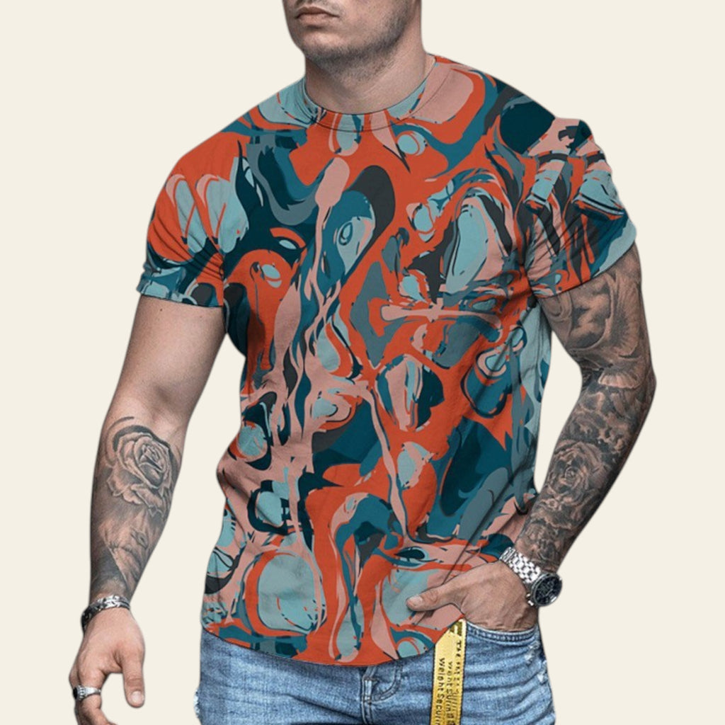 Man wearing a colorful abstract patterned shirt on a blurred street background