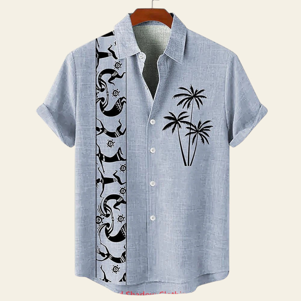 Light blue shirt with black palm tree and abstract design on a hanger against a white background.