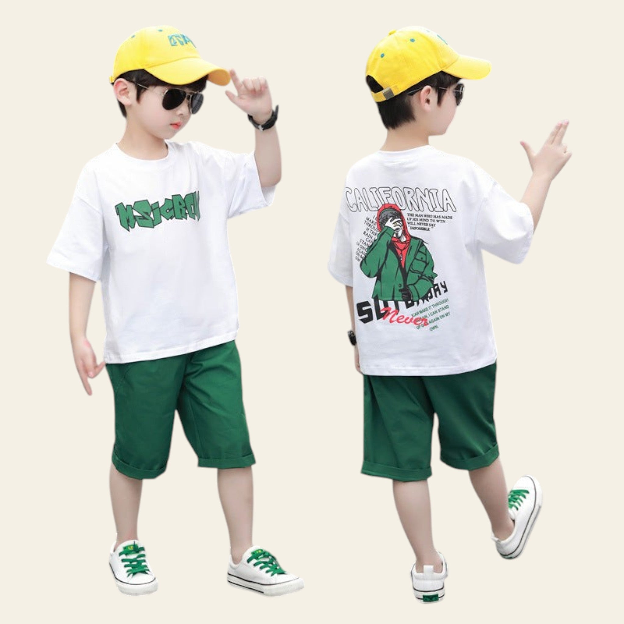Two children wearing matching outfits with white t-shirts, green shorts, and yellow caps on a street.