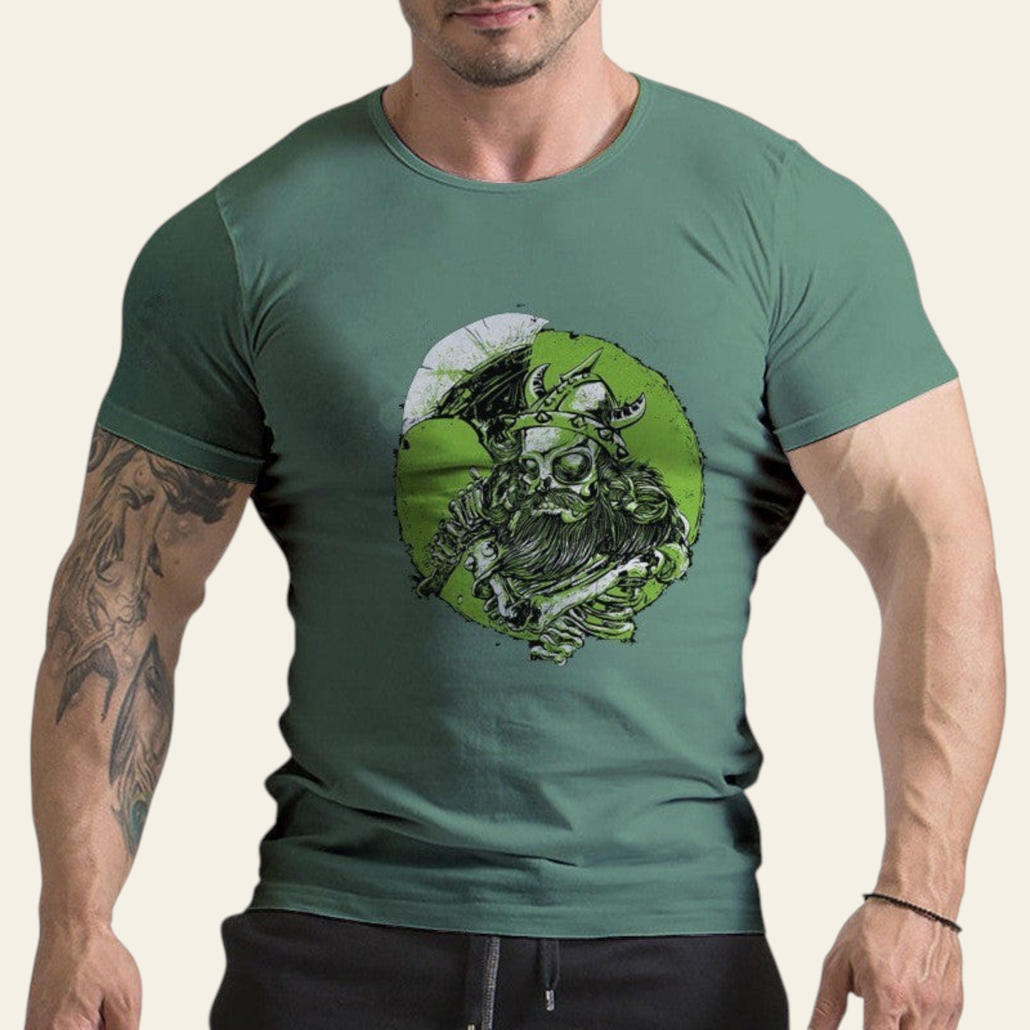 Man wearing a green t-shirt with a graphic design on a white background