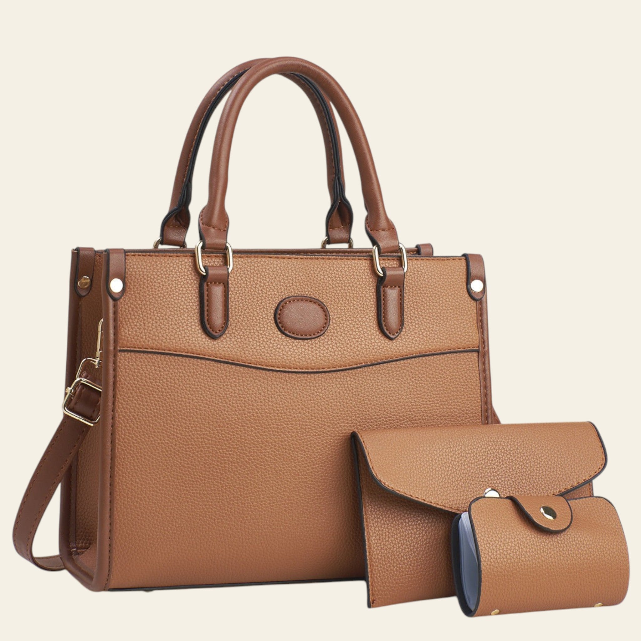 Brown leather handbag with matching pouch on a light background