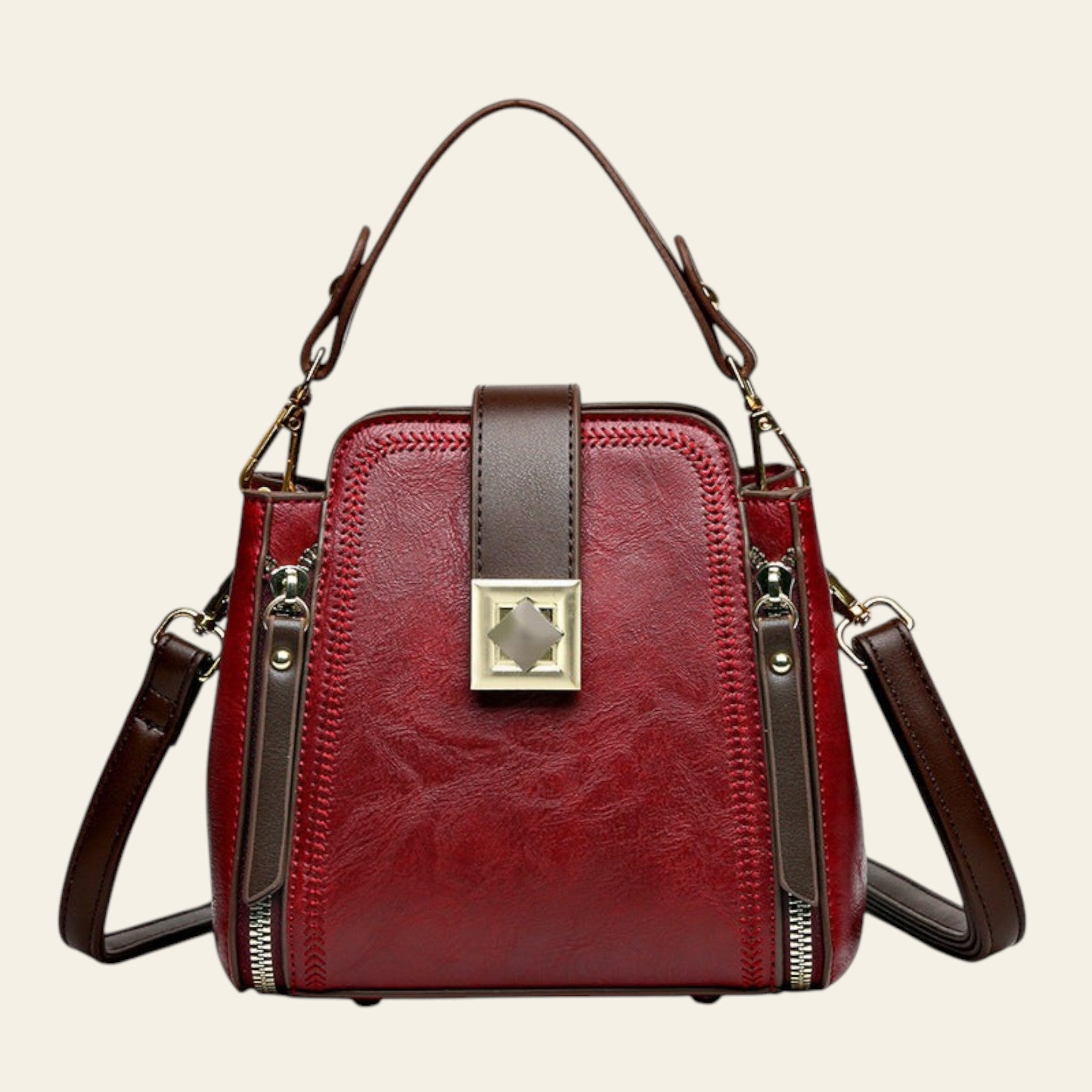 Red handbag with brown accents on a white background