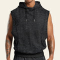 Man wearing a black sleeveless hoodie on a white background